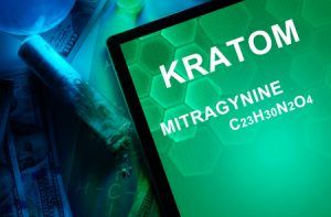 36473493 - tablet with the chemical formula of kratom (mitragyna speciosa) mitragynine. drugs and narcotics
